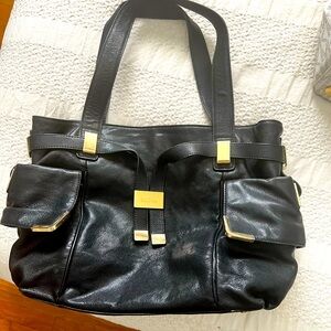 Michael Kors classic purse. Navy blue, looks black.